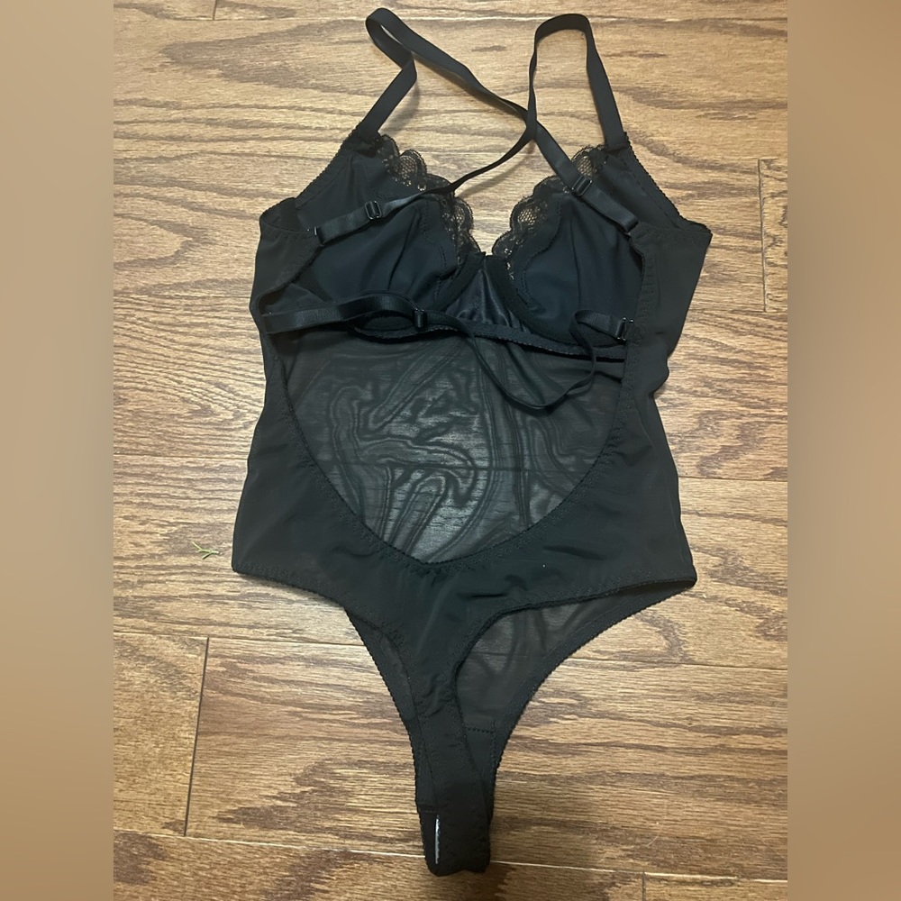 New, never worn without tags. Thong Bodysuit.